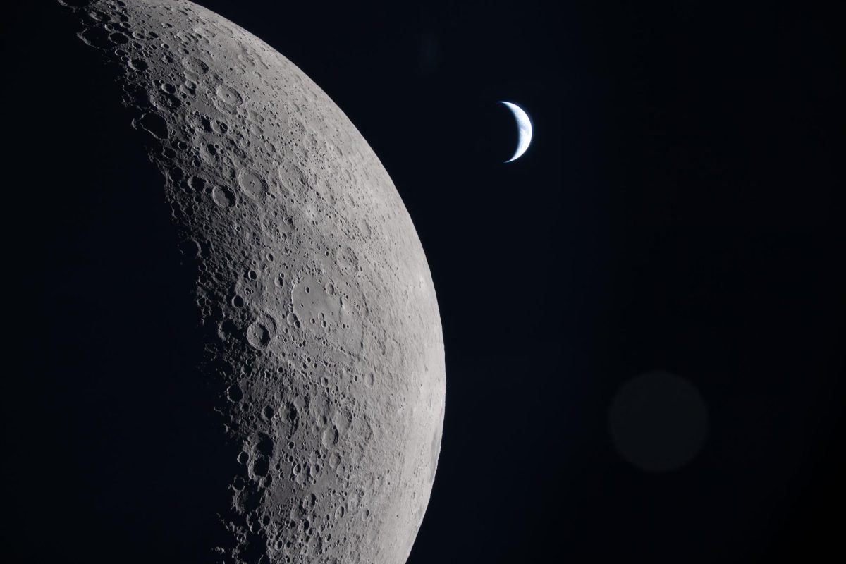 As the Artemis II crew came close to passing behind the Moon and experiencing a planned loss of signal, they captured this image of a crescent Earth. (Courtesy of NASA)